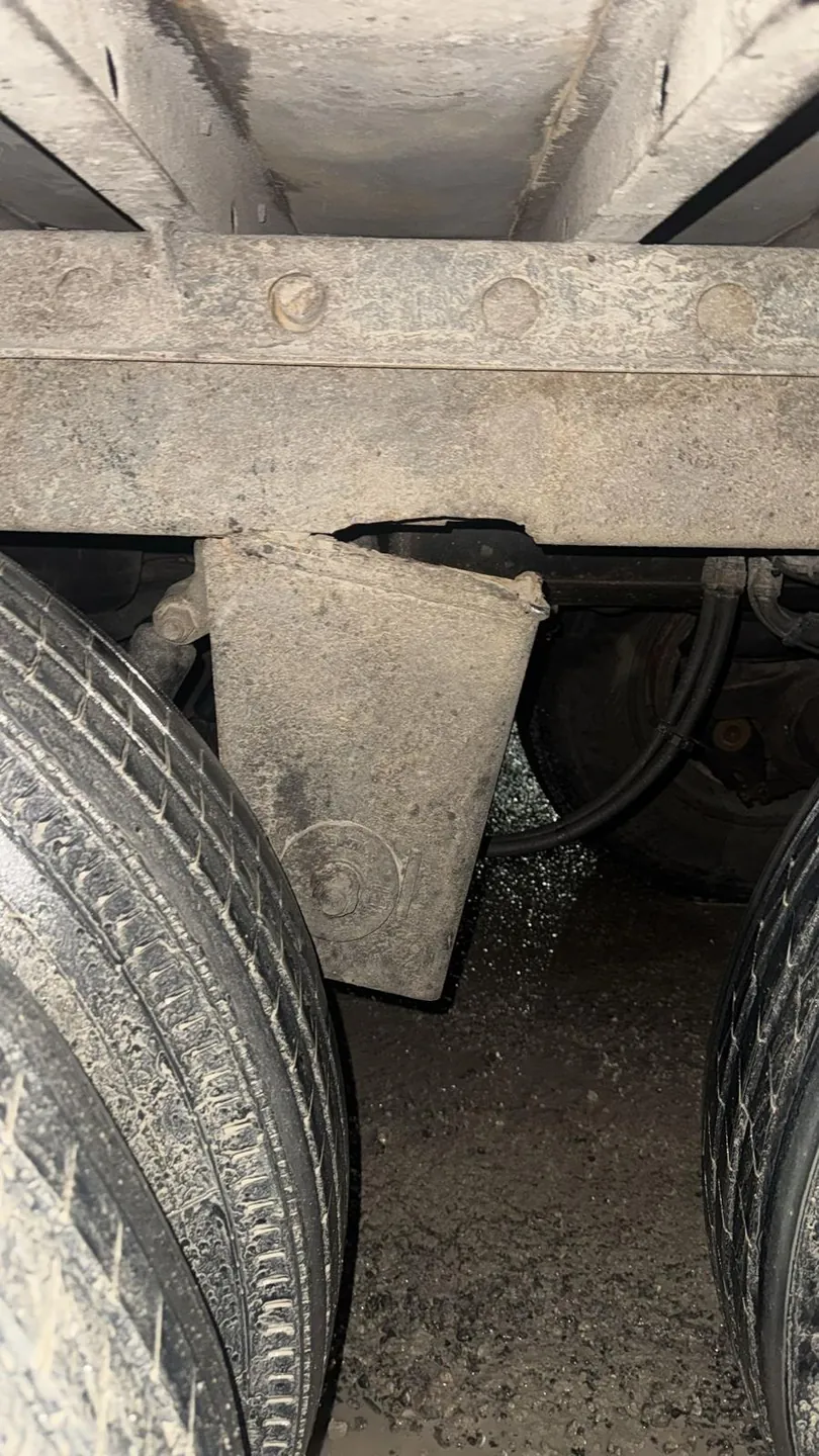 Cracked trailer bogie suspension hanger before welding repair